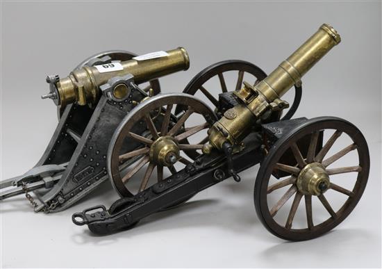 A model cannon and Gatling gun